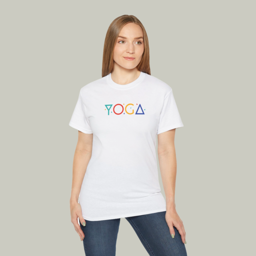 Gildan 2000 unisex ultra cotton tee A mockup of a woman wearing a t-shirt with a custom “Yoga” print on a light-green background.