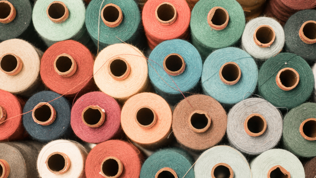 The different types of cotton Colorful cotton threads standing next to each other.