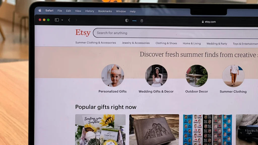 What business licenses are required to run an Etsy store A laptop screen with Etsy’s homepage cornershot.